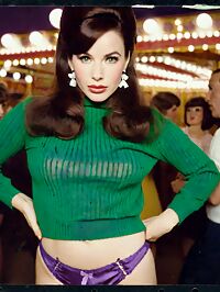 Woman in 1960s style attends the carnival's freak show